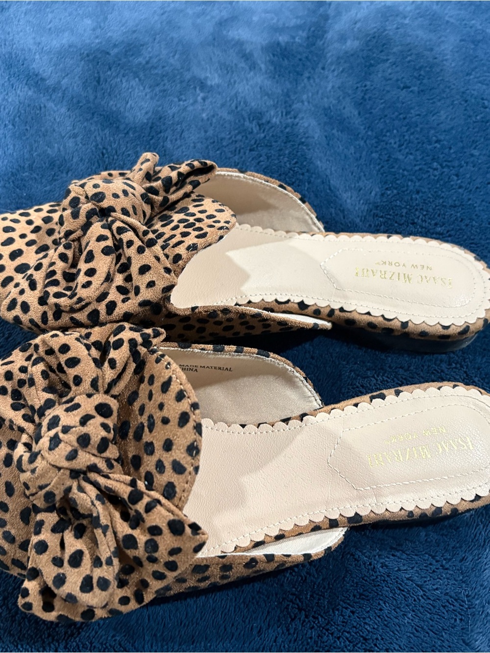 Isaac Mizrahi Tan and Black Knotted Slide Mules